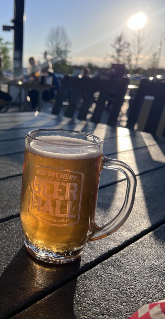 Glass of beer in the sunlight at 603 Brewery in Londonderry, NH