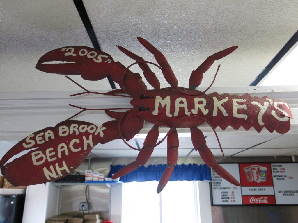 Lobster shaped sign inside Markey's Lobster Pool in Seabrook New Hanpshire