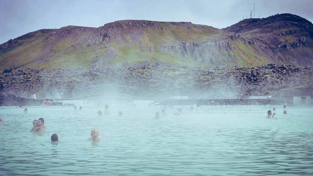 People swimming in the blue lagoon Iceland